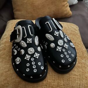 Black studded clog brand new.